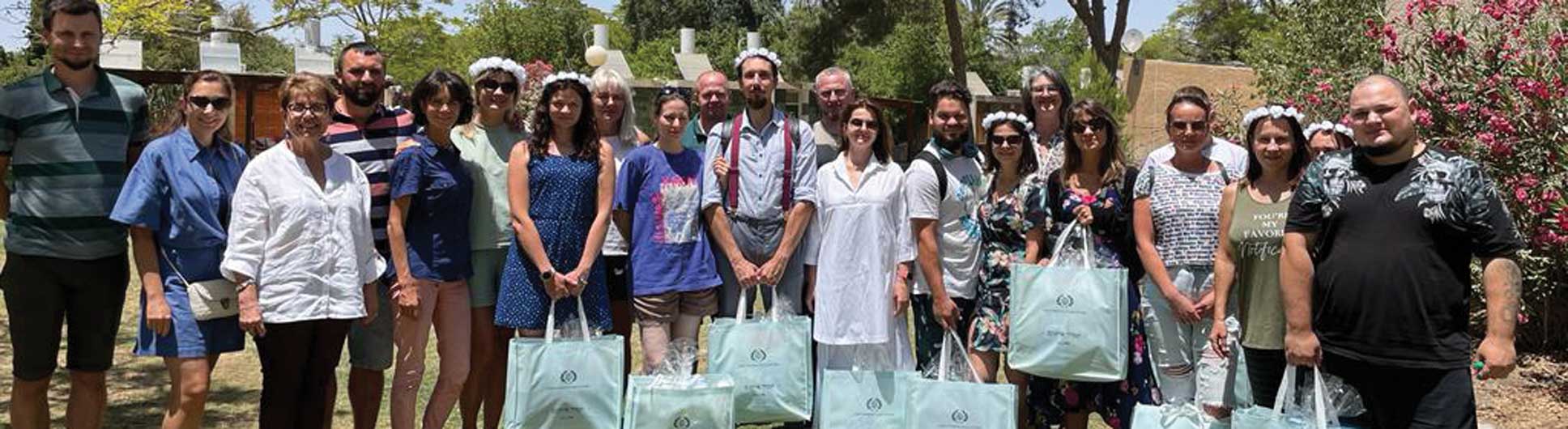 Aliyah Group Picture of Recipients with Gift Packages