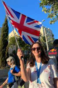 ICEJ Jerusalem March – Mary from England waving her country's flag