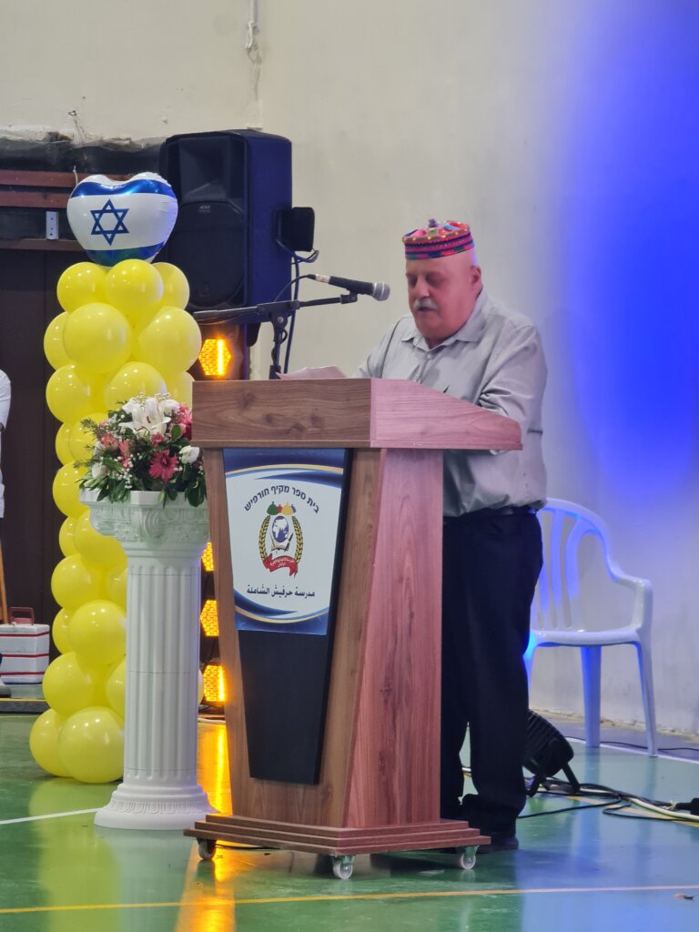 Mr. Amer addresses the students