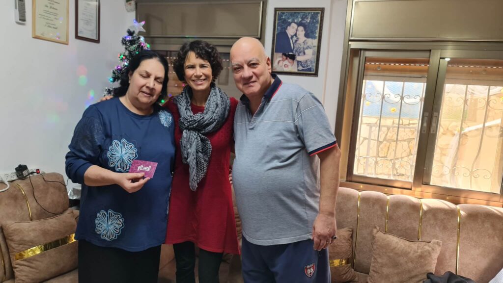 Mary and Kamal sharing a great moment with the ICEJ Aid team