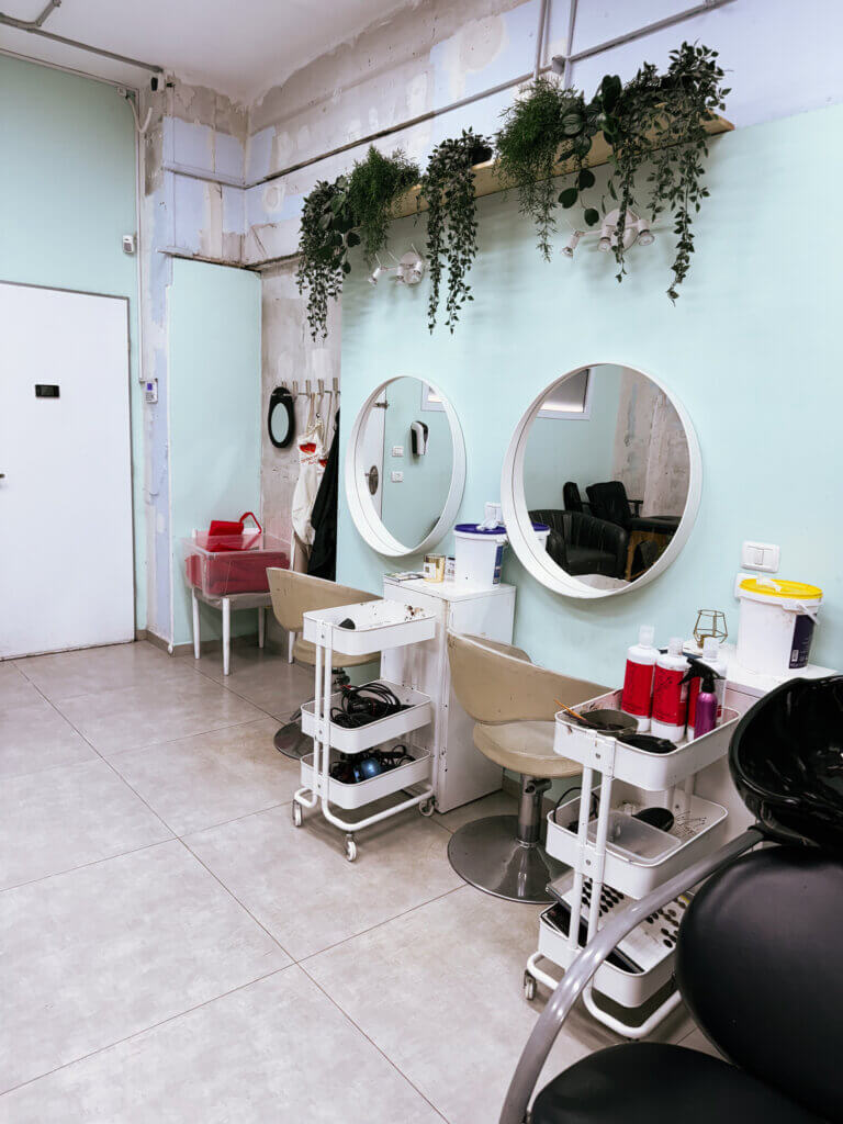 At the center, photo shows the hair salon section