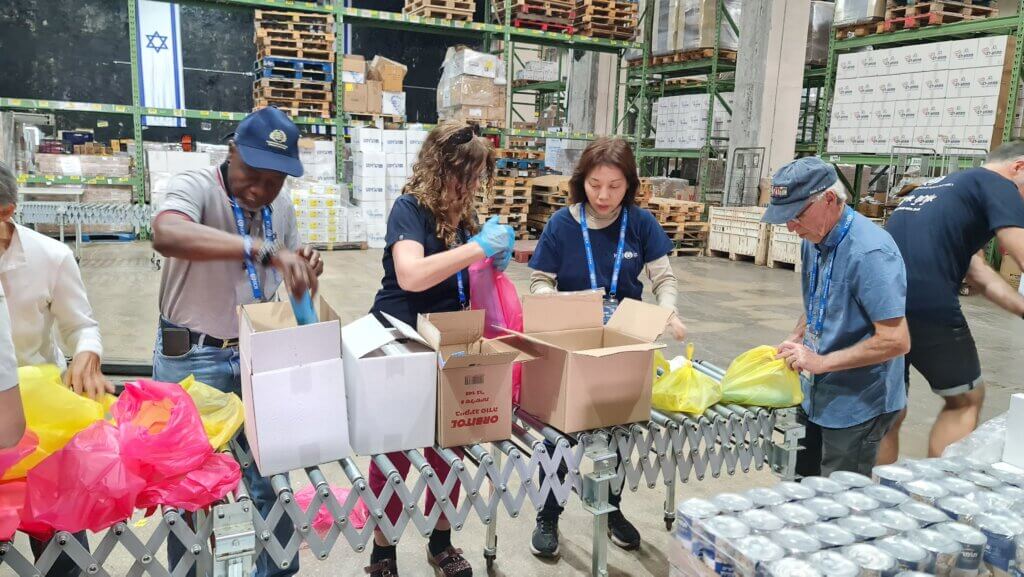 Food boxes being packed by tour members