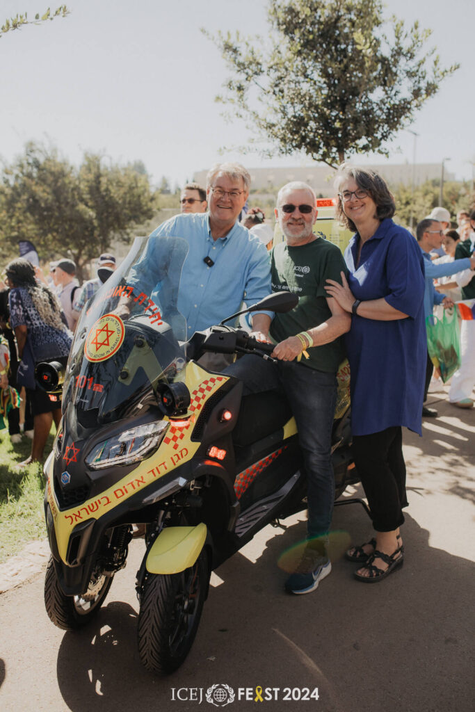 Standing next to this lifesaving first response equipment is ICEJ Senior Vice President & Spokesman David Parsons and ICEJ Vice President of Aid & Aliyah Nicole Yoder