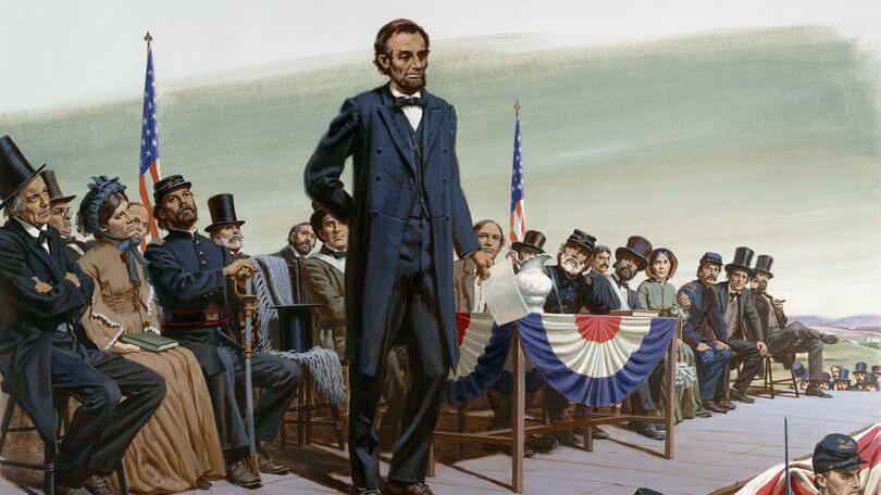 Photo shows Lincoln delivering his Gettysburg Address (georgepwood.com).