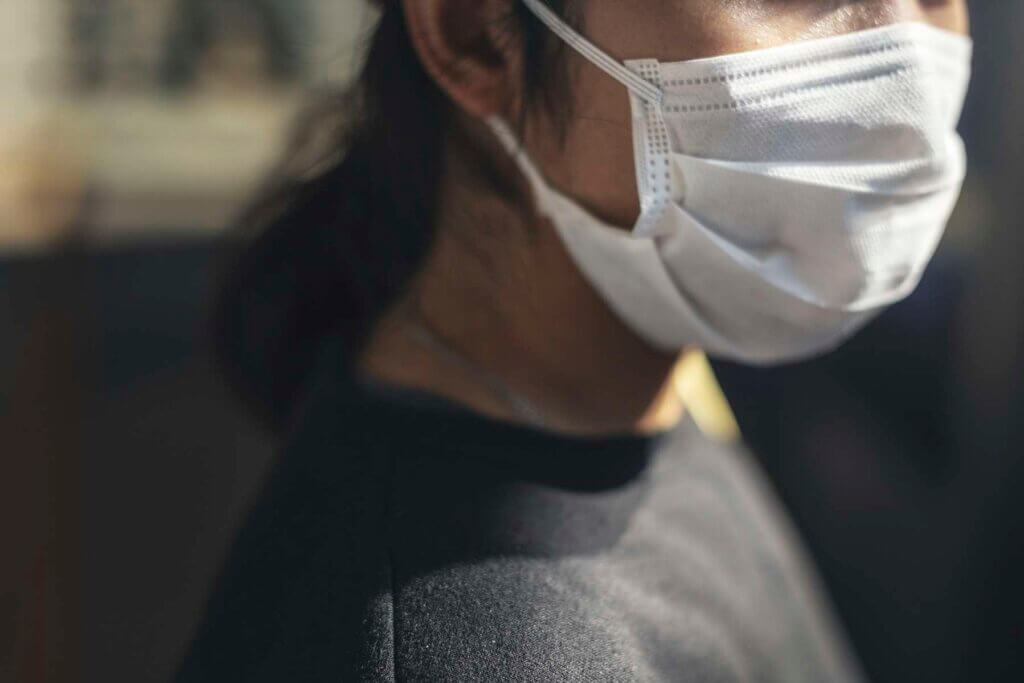 A woman wearing a face mask during COVID (Photo: Adobe-stock Free image)