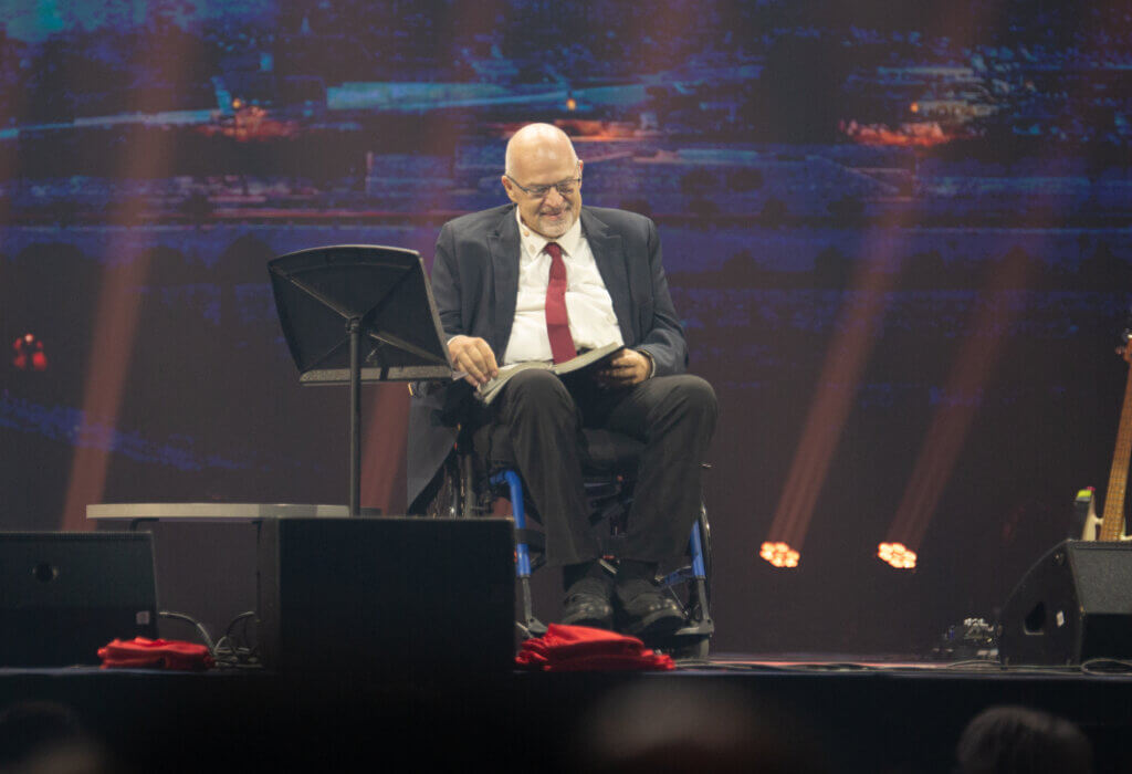 ICEJ President Dr. Juergen Buehler addresses Feast attendees about the Feast theme, “The Lord roars from Zion”