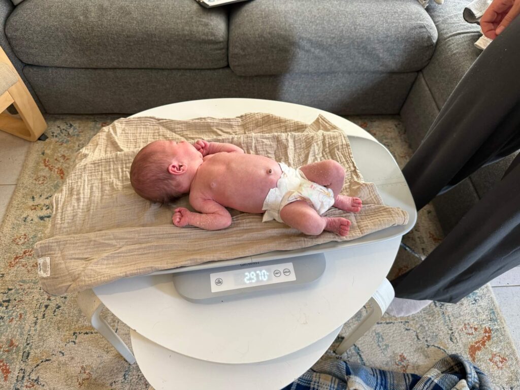 picture shows Orly’s baby is weighed